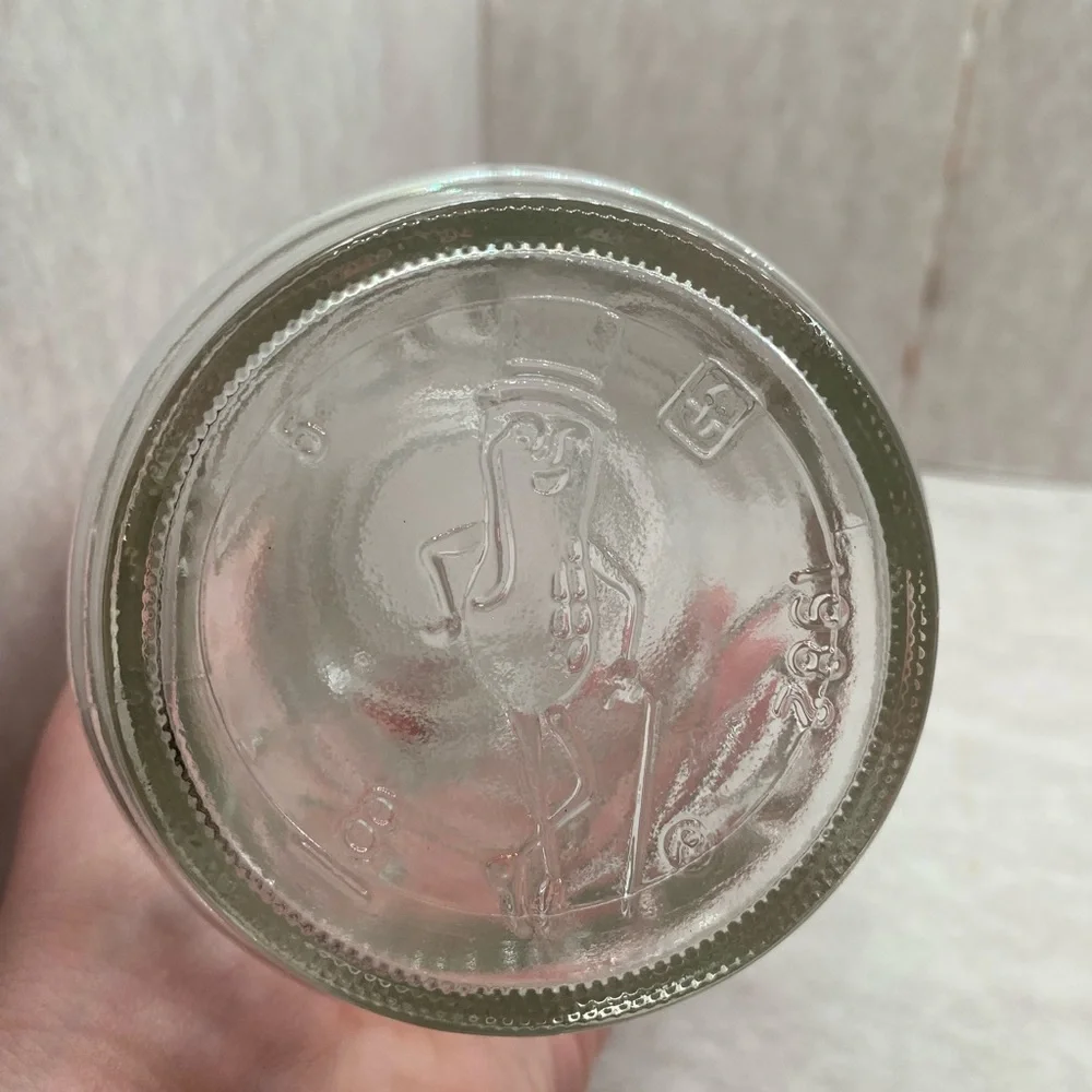 4 VINTAGE PLANTERS MR PEANUT GLASS JARS WITH LIDS (2) 1982, 1983, 1984